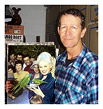 Fred Lang Jr holds a picture of Sabrina (taken by his father) at a Gold Coast bird santuary.