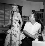 Sabrina takes a singing lesson with Maurice Burman