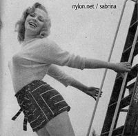 Sabrina on a ladder