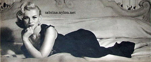 Sabrina, reclining
