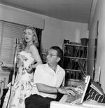 Sabrina takes a singing lesson with Maurice Burman