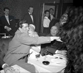 Sabrina and Tommy Yeardye interrupted by a gorilla om tje Stocrk Room, London 1959