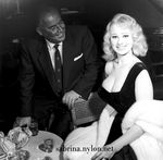 /sabrina/pix/sabrina-oz-melbourne-1958-12-black_dress-man-smiling.jpg