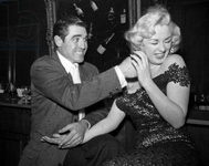 Steve Cochran tweaks Sabrina's ear 1956